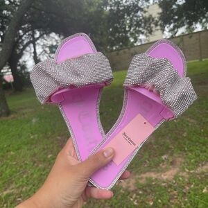 New Juicy Couture Pink Sparkly 
Flat slide sandals 
New with tags 
Size 7